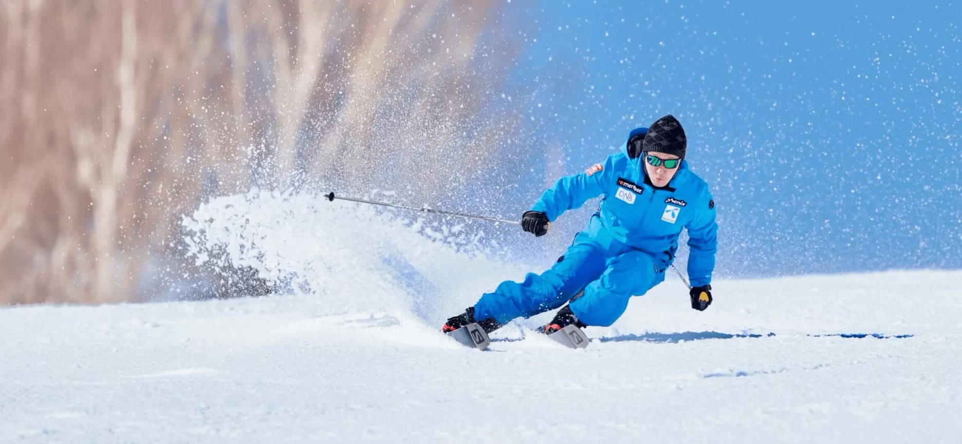 Skier carving on a groomed run at Shiga Kogen